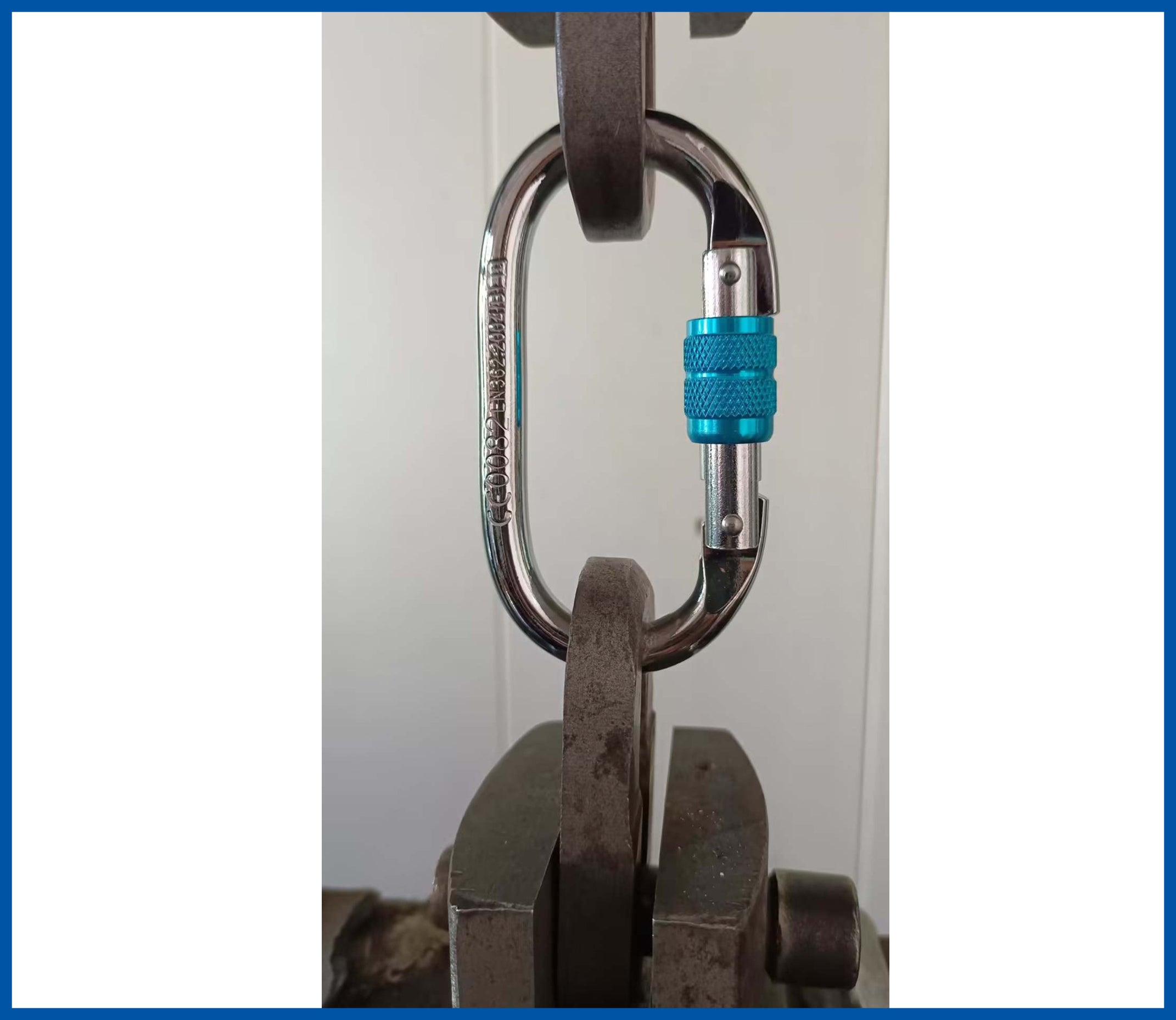 orbsoul carabiner placed inside tensile testing machine