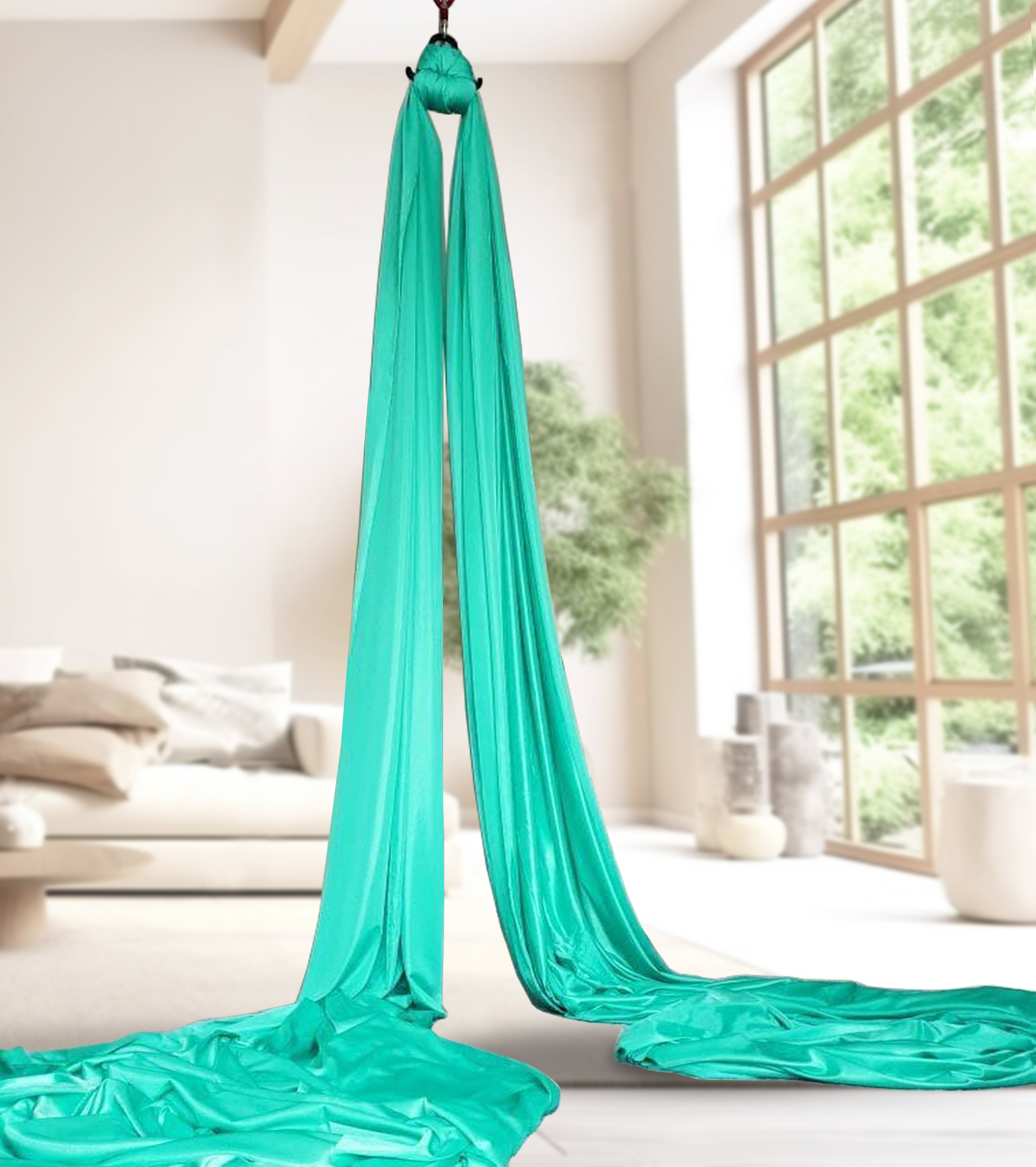 turquoise aerial silk setup at home