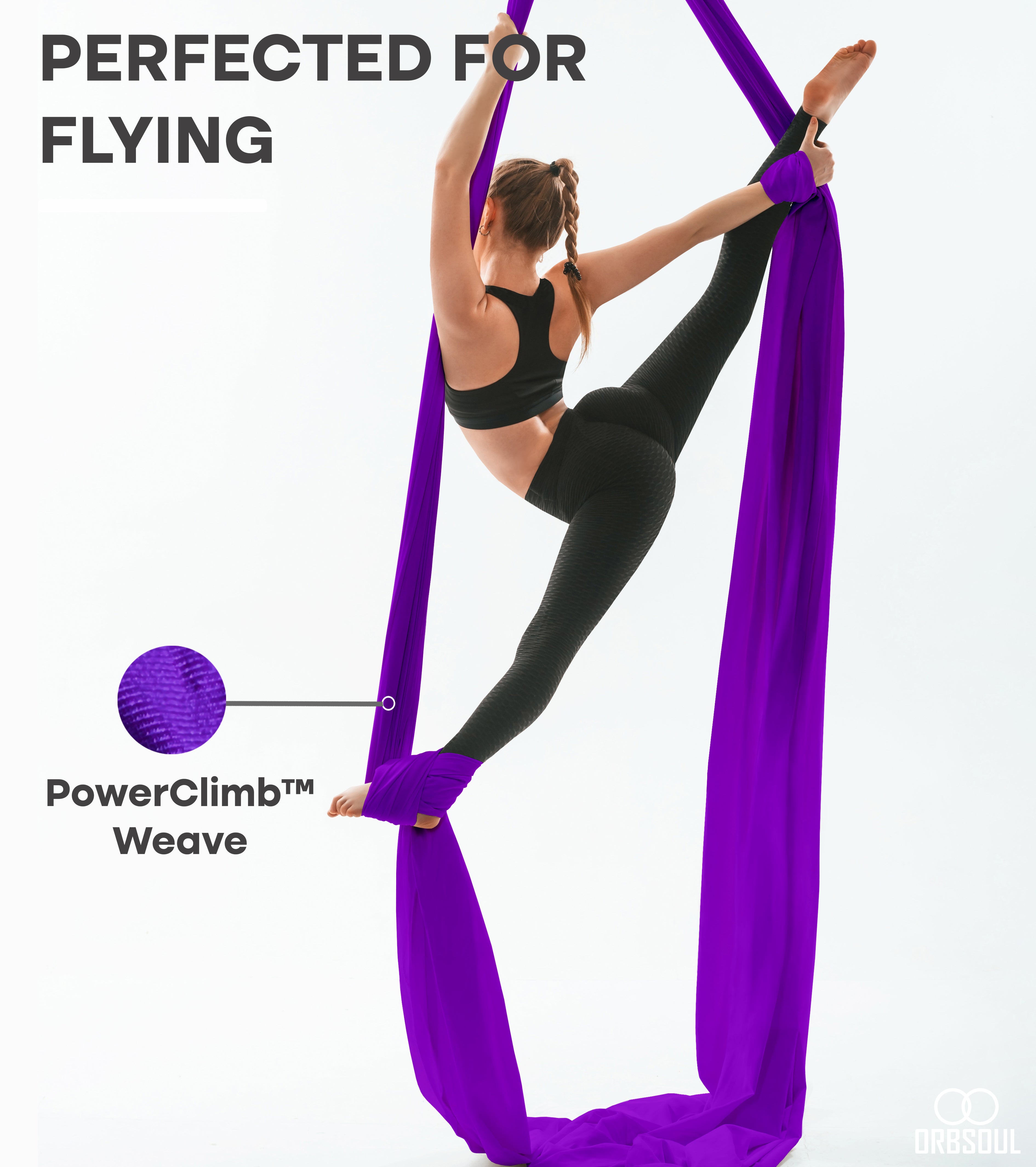 woman performing aerial art using aerial silks jewel purple