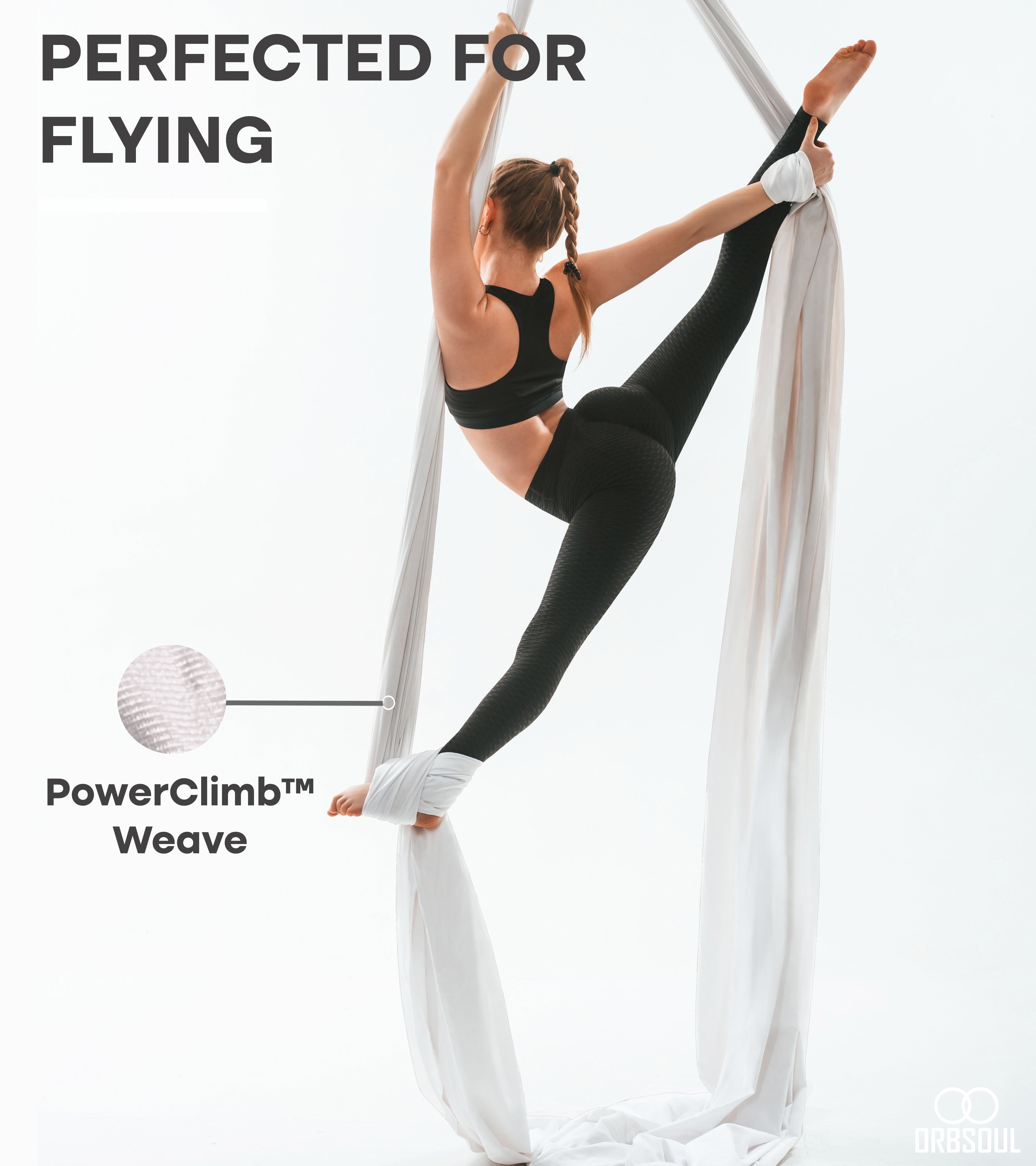 woman performing aerial art using aerial silks iridescent pearl