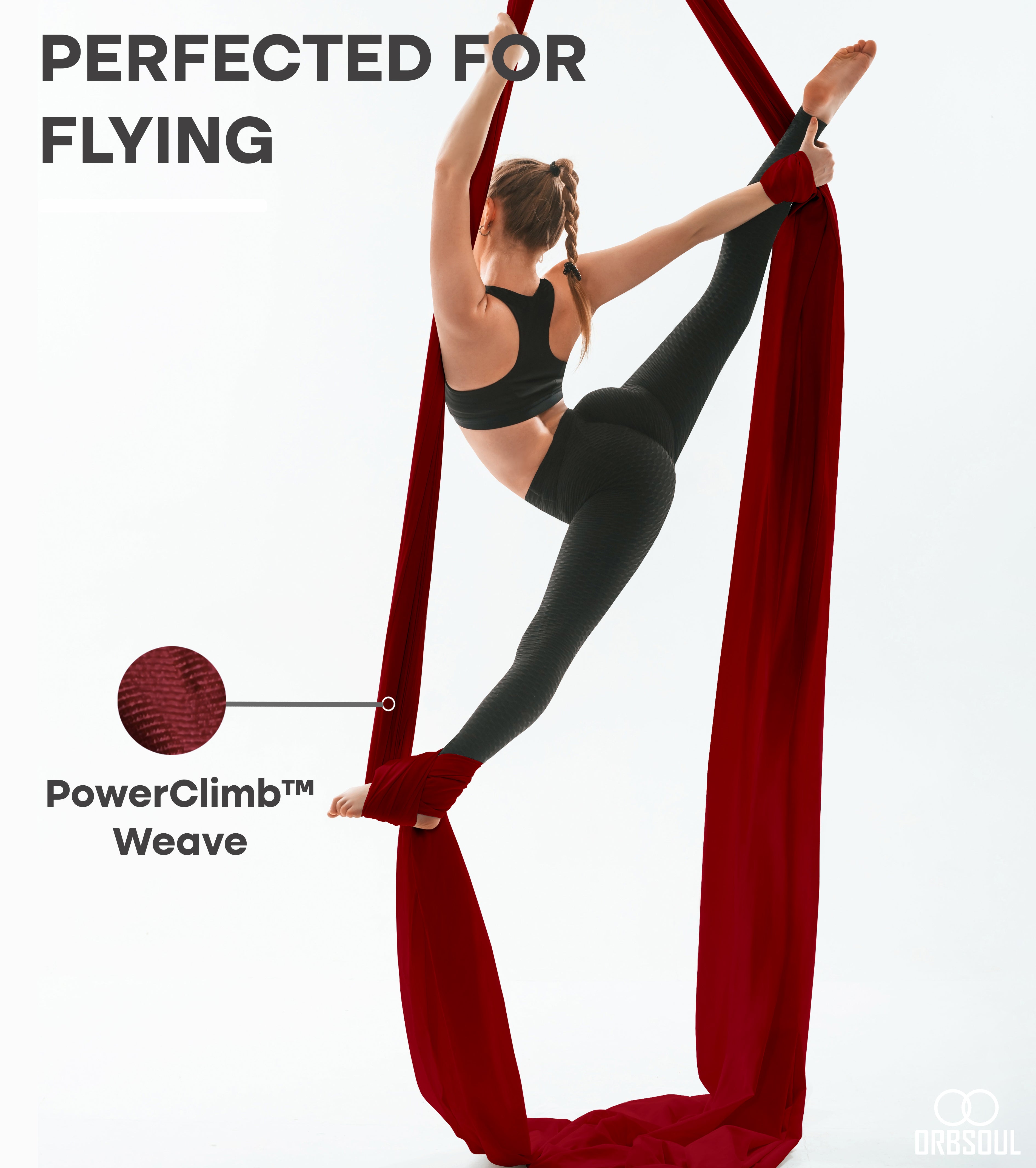 woman performing aerial art using aerial silks Rich rose